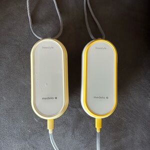 ONE Medela Freestyle Pump Unit in Yellow and White